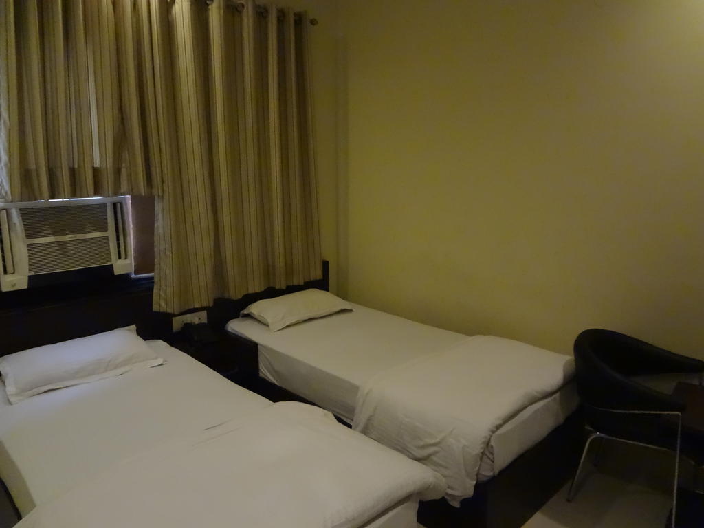 Hotel Siam International Deli Quarto foto